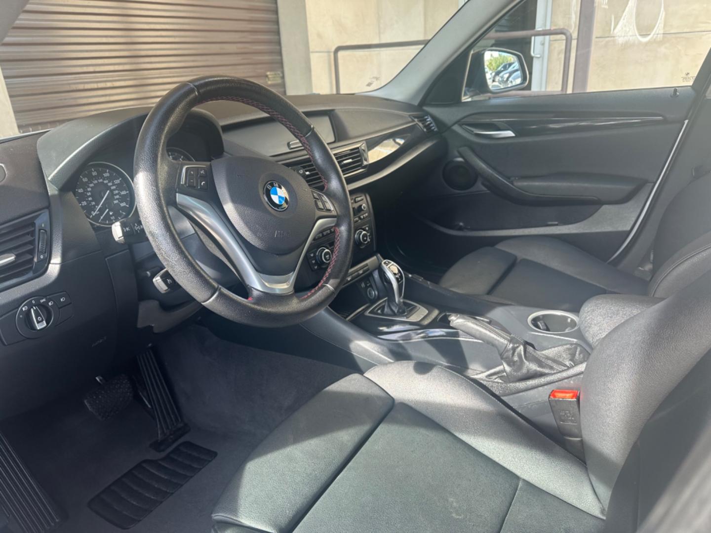 2013 Silver Metallic /Black BMW X1 sDrive28i (WBAVM1C59DV) with an 2.0L L4 DOHC 16V engine, 8-Speed Automatic transmission, located at 30 S. Berkeley Avenue, Pasadena, CA, 91107, (626) 248-7567, 34.145447, -118.109398 - Leather Seats! Premium Wheels! This 2013 BMW X1 sDrive28i looks and drives well. Bad Credit? We can help! We are the bank. All our cars are thoroughly inspected and reconditioned by our technicians. FREE CARFAX report. Stop by or call to speak with our friendly staff. Whether you have bad credit, no - Photo#9